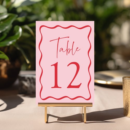 Modern Pink and Red Wavy Frame Wedding Table Number