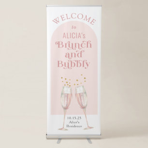 Modern pink arch brunch and bubbly welcome sign