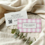 Modern Pink Watercolor Buffalo Plaid QR CODE Business Card<br><div class="desc">This stylish business card features a classic pink and white rustic buffalo plaid pattern, perfect for making a bold yet professional statement. The front includes two customizable text lines for your name or business name and your profession, ensuring a personalized and polished look. The back of the card offers a...</div>