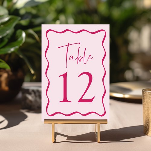 Modern Pink Wavy Frame Wedding Table Number