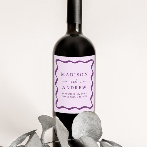 Modern Purple Wavy Frame Wedding Wine Label