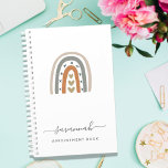 Modern rainbow rose gold gray white monogram 2024 planner<br><div class="desc">Decorated with a modern abstract, minimalist painted large rainbow with hearts in gray and dark rose gold. A chic white background. The modern symbol of hope. Personalize and add your name and a year in gray. The name is written with a trendy hand lettered style script with swashes. To keep...</div>