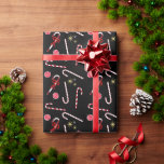 Modern Red Candy Cane Festive Christmas Black Wrapping Paper<br><div class="desc">Always merry,  Xmas candy canes pattern design with red bows and red peppermint Christmas candies. Cute,  whimsical candy cane design wrapping paper.</div>
