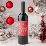 Modern red confetti typography Christmas Wine Label<br><div class="desc">A bright and original holiday or Christmas party wine label featuring the traditional red color and faux gold glitter confetti with a "Eat drink and be merry" typography lettering.</div>
