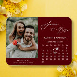 Modern Red Elegant Script Photo Save the Date Magnet<br><div class="desc">Modern Maroon Red | Burgundy Elegant Script ‘Save the Date’ Magnet featuring Custom Calendar with a beautiful Photo. Let your family, friends and colleagues know that you have set a date for your wedding celebration with this elegant magnet. To move the Ring marker > click blue ‘Personalize’ > scroll down...</div>