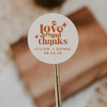 Modern Retro Cream and Orange Wedding Thank You  Classic Round Sticker<br><div class="desc">This Modern Retro Cream and Orange Wedding Thank You Classic Round Sticker is a great way to add a little more personalization to your big day. The color palette of orange and cream gives this an extra modern,  yet vintage retro look. Say thank you with Love & Thanks.</div>