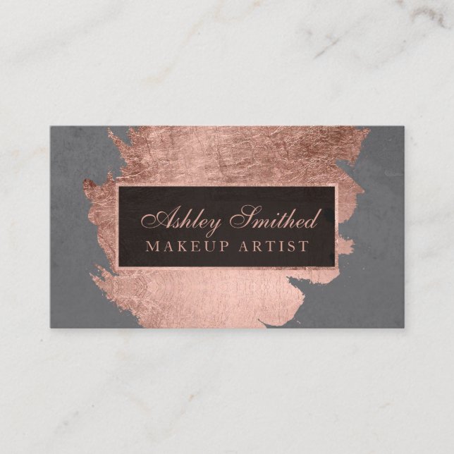 Modern rose gold brushstroke grey cement makeup business card (Front)