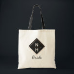 Modern Rose Gold Foil Framed Monogram Bride Tote Bag<br><div class="desc">Modern Rose Gold Foil Framed Monogram. Trendy Geometric Square Frame Stacked Monogram, With elegant script font, and Simple minimal design. Perfect for a luxurious and stylish fall or winter wedding, with copper colored rose gold palette, dark almost black gray, and white - Bride Tote Bags! ~ Check my shop to...</div>