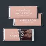 Modern Rose Gold Mr and Mrs Wedding Hershey Bar Favors<br><div class="desc">A luxe and contemporary wedding favor wrapper featuring "Mr and Mrs" in flowing calligraphy script with the couple's surname displayed as a striking monogram centerpiece. Warm rose gold tones add a touch of metallic glamour to this sleek design. Personalize with your names and wedding date for an elevated reception thank...</div>