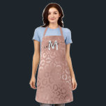 Modern Rose Gold Pink Leopard Cheetah Monogram Apron<br><div class="desc">The design depicts a modern, elegant, and chic faux printed rose gold foil leopard cheetah animal print pattern on top of a rose pink background. It's cool, unique, and trendy. Just customize this design with your own personalized monogram name and initial. ***IMPORTANT DESIGN NOTE: For any custom design request such...</div>