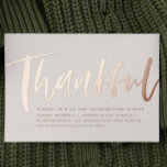 Modern rose gold thankful Thanksgiving dinner Foil Invitation<br><div class="desc">Bold and stylish,  this modern Thanksgiving dinner invitation sets the tone for a stylish celebration. A brush script "thankful" in rose gold foil frames simple customizable text for all your party details. This invitation coordinates with the Lea Delaveris Design Thankful Thanksgiving collection. The backer is a speckled rose color.</div>