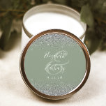 Modern Sage Green Silver Glitter Edge Wedding Classic Round Sticker<br><div class="desc">This elegant modern wedding sticker features a faux silver glitter design on the top and bottom edge. Easily customize the white text on a sage green background,  with the names of the couple in handwriting calligraphy over a large ampersand.</div>