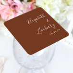 Modern Script Coffee Brown Wedding Square Paper Coaster<br><div class="desc">These simple,  modern wedding coaster favors feature white text aligned to the right margin on a coffee brown background. Add the names of the bride and groom in stylish handwriting calligraphy.</div>