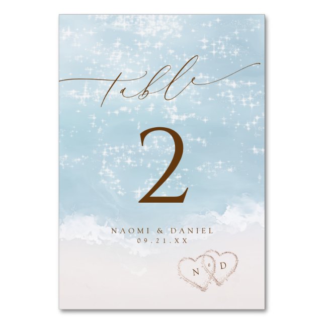Modern Script Hearts In The Sand Beach Wedding  Table Number (Front)
