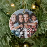 Modern Script Merry Christmas Family Photo Ceramic Ornament<br><div class="desc">Stylish photo ornament design for the holidays features your favorite family image with Merry Christmas text in modern brushed script lettering. Personalize the custom text with your last name or family name and the year. A simple pattern of white winter snowflakes dresses up the back of the ornament. The slate...</div>