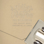 Modern Script Merry Christmas Return Address Embosser<br><div class="desc">Stylish Merry Christmas personalized holiday return address embosser features script writing and accents of branches with holly leaves and berries. Personalize the modern text with your family's last name and home address.</div>