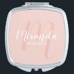 Modern Script Personalized Bridesmaid Compact Mirror<br><div class="desc">Add a personal touch to your wedding with personalized bridesmaid gift. This design features personalized bridesmaid's name in white modern script font style and monogram in blush pink modern script font style as background with title and wedding date in white modern sans serif font style on blush pink background. Also...</div>