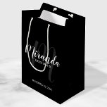 Modern Script Personalized Bridesmaids Black Medium Gift Bag<br><div class="desc">Personalized Bridesmaids Gift Bag featuring personalized bridesmaid's name in white modern script font style and monogram in grey modern script font style as background with title and wedding date in white modern sans serif font style on black background. Also perfect for groomsman, best man, ring bearer, father of the bride,...</div>