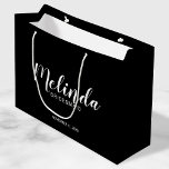 Modern Script Personalized Bridesmaids Large Gift Bag<br><div class="desc">Modern Script Black and White Personalized Bridesmaids Gift Bag
featuring personalized bridesmaid's name in white modern script font style with title and wedding date in modern sans serif font style on black background.

Also perfect for Maid of Honor,  Flower Girl,  Mother of the Bride,  Groomsmen,  Best man and more.</div>