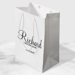 Modern Script Personalized Groomsman Medium Gift Bag<br><div class="desc">Personalized Groomsman Gifts
featuring personalized groomsman's name in black modern script font style with title and wedding date in modern sans serif font style.

Also perfect for best man,  father of the bride,  bridesmaid,  maid of honor,  mother of the bride and more.</div>