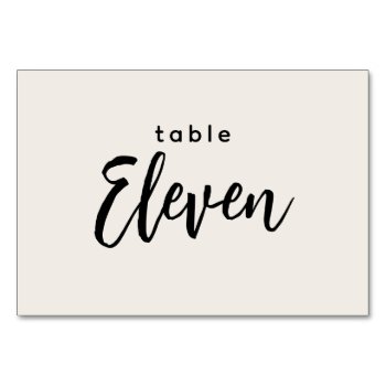 Modern Script Table 11 Eleven Off-white Wedding Table Number by GraphicBrat at Zazzle