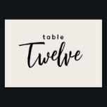 Modern Script Table 12 Twelve Off-White Wedding Table Number<br><div class="desc">Modern Script Table 12 Twelve Off-White Wedding or Dinner Party Table Number. 12 is written out in a trendy chic hand-lettered font. The background color of this table number is color editable, just click the customize further button to select any color you need. A stylish yet simple design in black...</div>