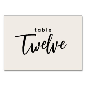 Modern Script Table 12 Twelve Off-white Wedding Table Number by GraphicBrat at Zazzle
