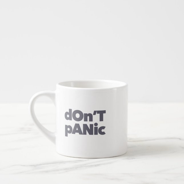 Modern, simple, bold cool graphic of Don't Panic Espresso Cup (Left)