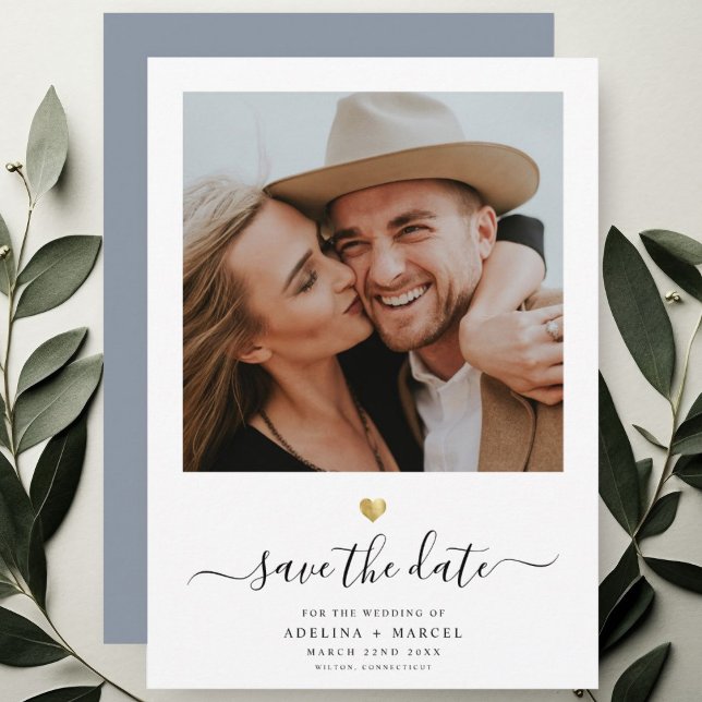 Modern Simple Minimalist Gold Dusty Blue Script Save The Date (A "Save the Date" card for a wedding surrounded by elegant green leaves.)