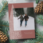 Modern snowy Christmas tree one photo stylish Holiday Card<br><div class="desc">With a modern tree of white flurries and a soft mauve background, this one-photo holiday card is the perfect way to send holiday greetings. The message is customizable, and the design is modern and chic. Great for a family Christmas card, for couples or anyone with sophisticated taste. This unique Christmas...</div>
