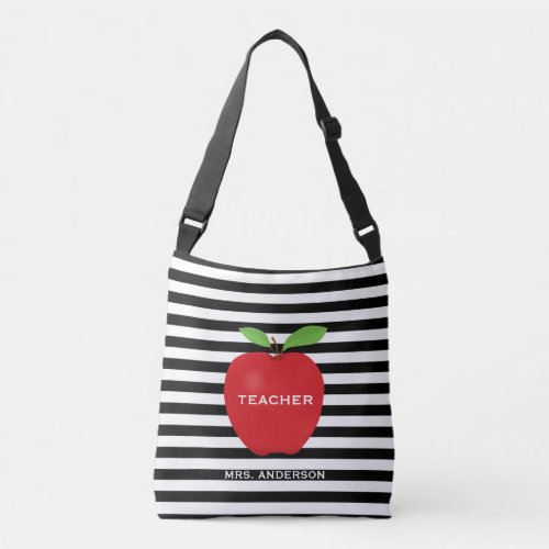 Modern Teacher Red Apple Horizontal Stripes Crossbody Bag - This cross body bag features a trendy black and white stripe pattern with a graphic of a red apple and the text "teacher" on the apple. Custom text allows you to personalize with the teacher's name.