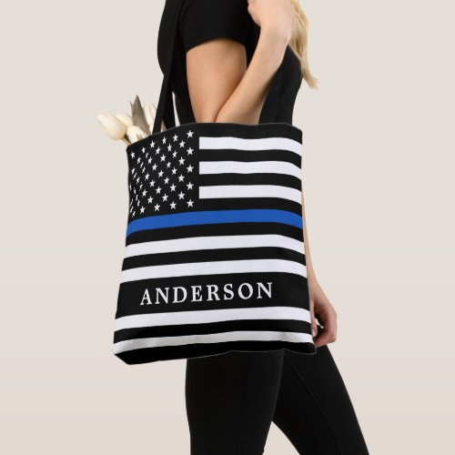 Modern Thin Blue Line Personalized Police Officer  Tote Bag - Thin Blue Line Flag Tote Bag - USA American flag design in Police Flag colors, modern black blue design .
Perfect for all police officer's, police mom's and police wife's . Personalize with police officer's name, and or badge number, or family name. This thin blue line tote bag is perfect for a law enforcement retirement gifts, or police graduation gifts. . COPYRIGHT © 2020 Judy Burrows, Black Dog Art - All Rights Reserved. Modern Thin Blue Line Personalized Police Officer Tote Bag 