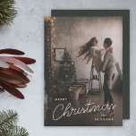 Modern Trendy Christmas | Dark Dusky Couple Photo Holiday Card<br><div class="desc">A trendy stylish holiday photo flat greeting card with modern and handwritten script typography in white over a full photo with black faded tint and a deep smoky green gray color on the reverse. The photo and name can be easily customized for a personal touch. A simple, minimalist and contemporary...</div>