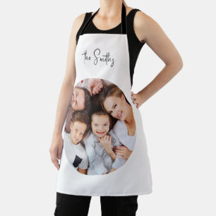 Modern Trendy Script Family Name Round Photo Apron