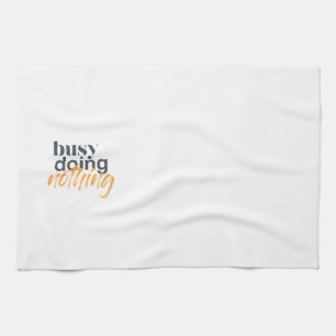 Modern, trendy, urban design of Busy Doing Nothing Kitchen Towel
