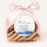 Modern Watercolor | Blue Thank You Wedding Favor Classic Round Sticker<br><div class="desc">These modern watercolor blue thank you wedding favor stickers are perfect for a stylish contemporary wedding reception. The minimalist, classic and elegant design collection features simple water color paint brush strokes in pretty jewel tones. Personalize the sticker labels with your names, the event (if applicable), and the date. These stickers...</div>
