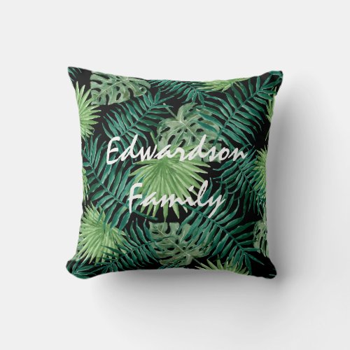 Modern watercolor tropical leaves family name throw pillow