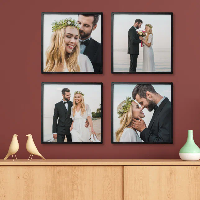 Four photo tiles with black frames displayed on a burgundy wall. In the background there is a vase and wooden bird figures. 