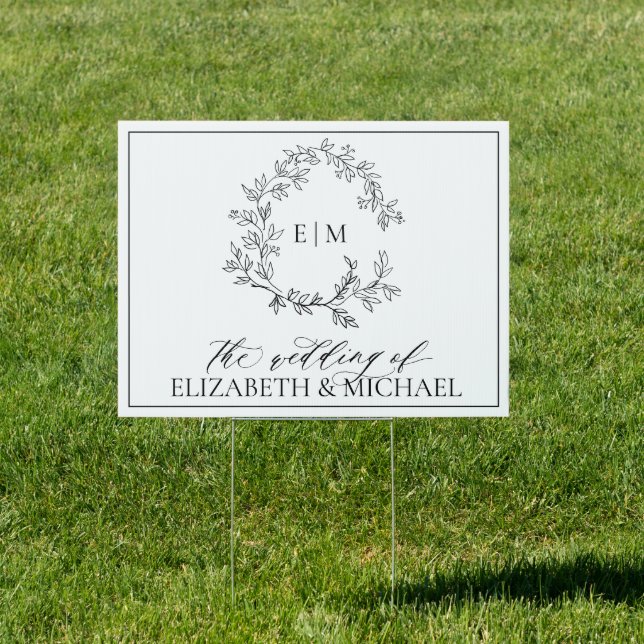 Modern White Black Leafy Crest Monogram Wedding Sign (Insitu)