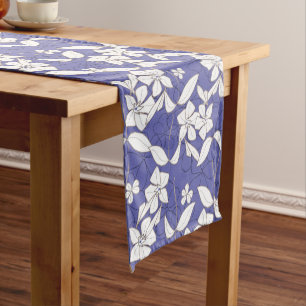 Modern white flowers on a periwinkle medium table runner