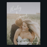Modern White Handwritten Script Wedding Photo Faux Canvas Print<br><div class="desc">Modern wedding faux canvas print with a simple design featuring your names in an elegant handwritten script across the top left and your wedding date in the bottom right, over your favorite photo. The chic hand lettering adds a romantic touch. Display your favorite engagement picture at your reception or give...</div>