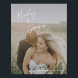 Modern White Handwritten Script Wedding Photo Faux Canvas Print<br><div class="desc">Modern wedding faux canvas print with a simple design featuring your names in an elegant handwritten script across the top left and your wedding date in the bottom right, over your favorite photo. The chic hand lettering adds a romantic touch. Display your favorite engagement picture at your reception or give...</div>