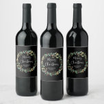 Modern Wreath and Script | Merry Christmas Black Wine Label<br><div class="desc">These simple and stylish wine labels feature a stunning watercolor wreath with green and faux gold leaves and red holly berries,  and white modern script typography that says "Merry Christmas" on a dark black background.</div>