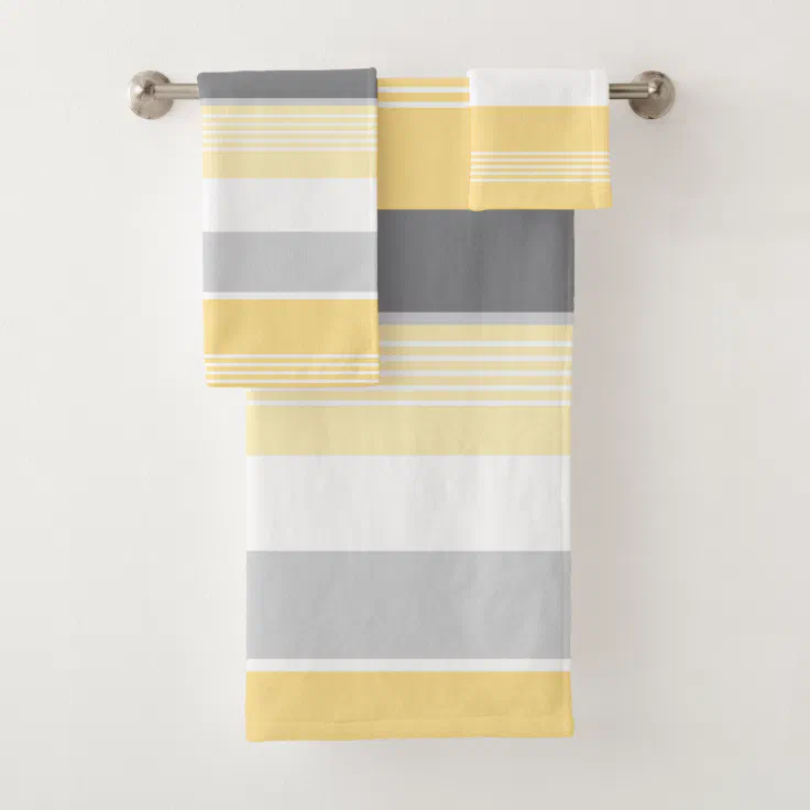 yellow and grey bath towels