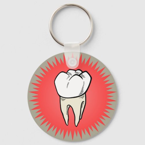 Molar freshly extracted on a red starburst keychain