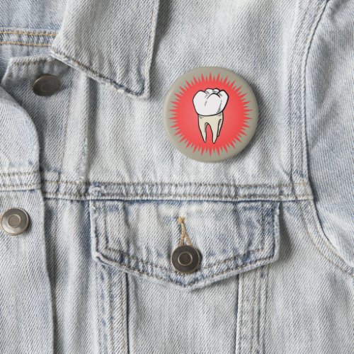 Molar freshly extracted on a red starburst pinback button