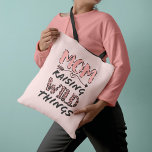 Mom Raising Wild Things Quote Funny Leopard Print Tote Bag<br><div class="desc">This cute and funny design is perfect for any mom on Mother's Day, for her birthday, or all year round. It features the quote, "Mom. Raising Wild Things, " with a hand-drawn heart arrow, and leopard cheetah print typography in blush pink and black. It's modern, sweet, girly, and cool; the...</div>