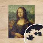 Mona Lisa | Leonardo da Vinci Jigsaw Puzzle<br><div class="desc">Mona Lisa (1503-1506) by Italian Renaissance artist Leonardo da Vinci. The original work is oil on poplar wood panel. This famous painting is thought to be a portrait of Lisa Gherardini, and has been acclaimed as "the best known, the most visited, the most written about, the most sung about, the...</div>