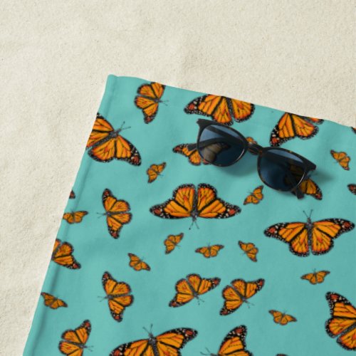 Monarch butterflies beach towel