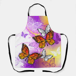 Monarch Butterflies on Purple Background Apron